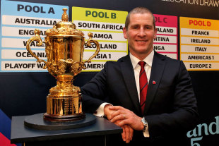 England coach Stuart Lancaster poses with the Rugby World Cup, 2015 Rugby World Cup pool allocation draw, Tate Modern, London, England, December 3, 2012