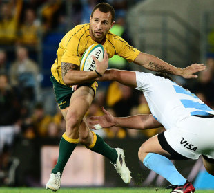 Australia's Quade Cooper dodges a tackle, Australia v Argentina, Rugby Championship, Skilled Park, Gold Coast, Australia, September 15, 2012