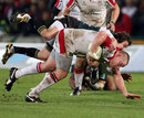 Northampton's Lee Dickson attempts to tackle Ulster's Tom Court