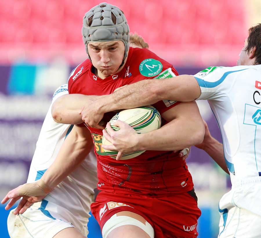 Scarlets' Jonathan Davies tries to force his way through