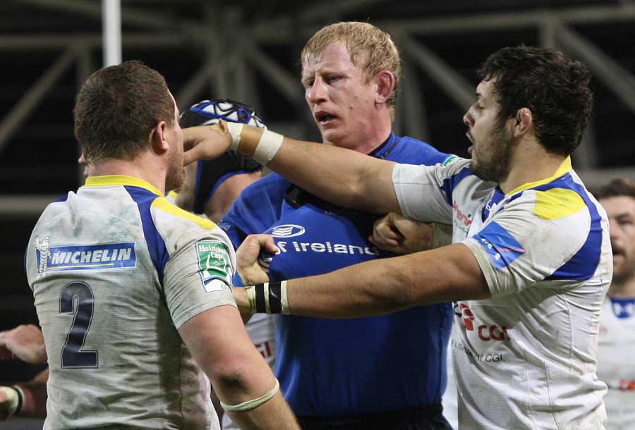 Leinster's Leo Cullen faces up to Benjamin Kayser 