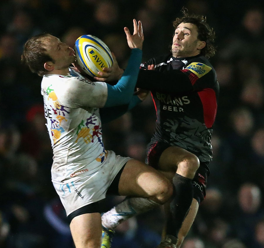 Worcester's Chris Pennell and London Welsh's Tom Arscott compete for a high ball
