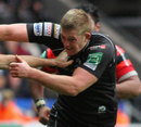 Ospreys' Lloyd Peers tries to avoid a hand-off