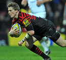 Saracens' David Strettle dives over to score a try