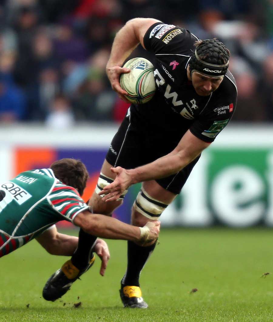 Ospreys' Ian Gough is tackled by Leicester's Anthony Allen