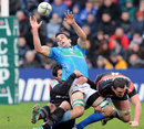 Treviso winger Tommaso Benvenuti is shackled by the Toulouse defence