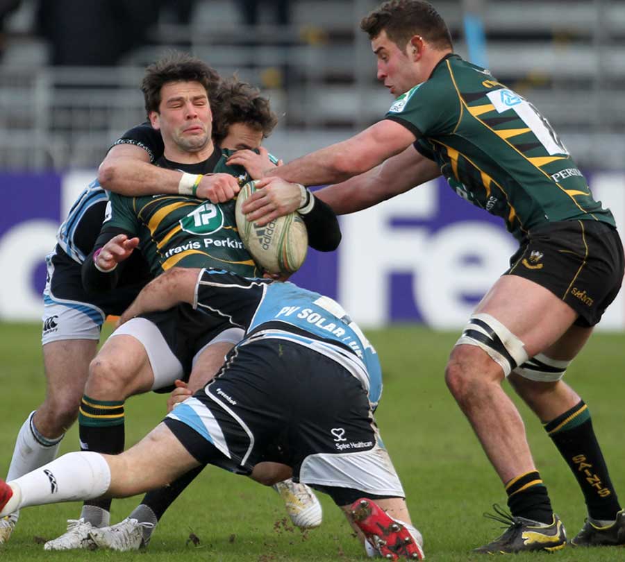 Northampton's Ben Foden is tackled by Glasgow's Ruaridh Jackson 