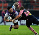 London Welsh's  Alfie To'oala Vaeluaga is tackled by Stade Francais' Pascal Pape