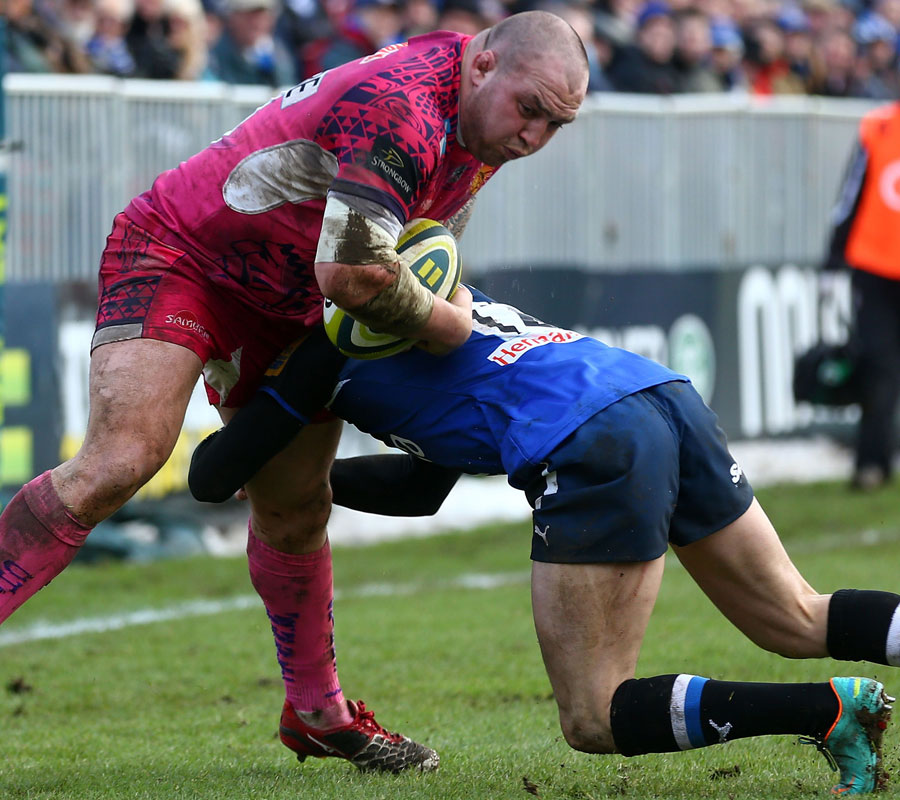 Exeter's Craig Mitchell is tackled on the touchline