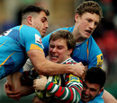 Leicester's Matthew Tait is wrapped up by the Wasps defence