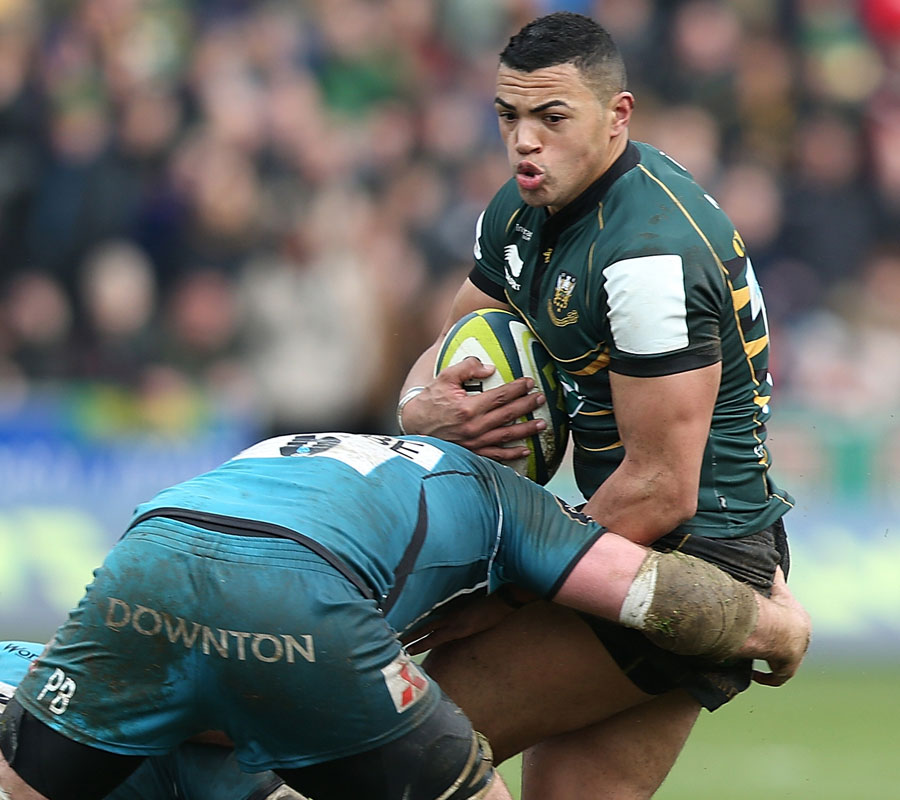 Northampton's Luther Burrell is halted by the Gloucester defence