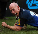 Bath's Peter Stringer delights in scoring a try