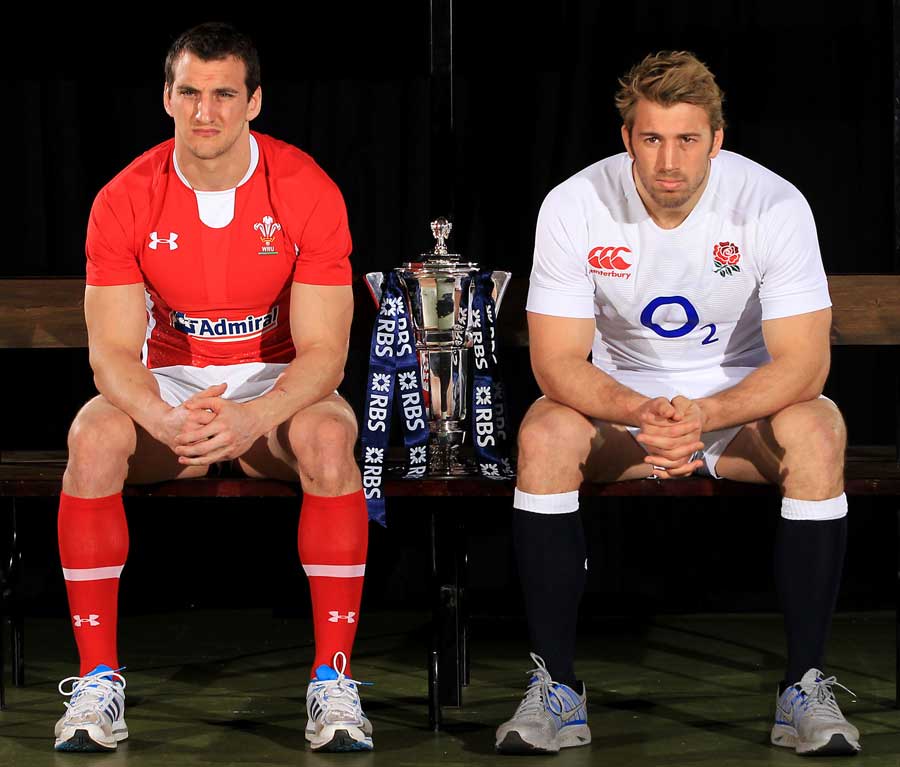 Wales' Sam Warburton and England's Chris Robshaw sit alongside the Six Nations trophy