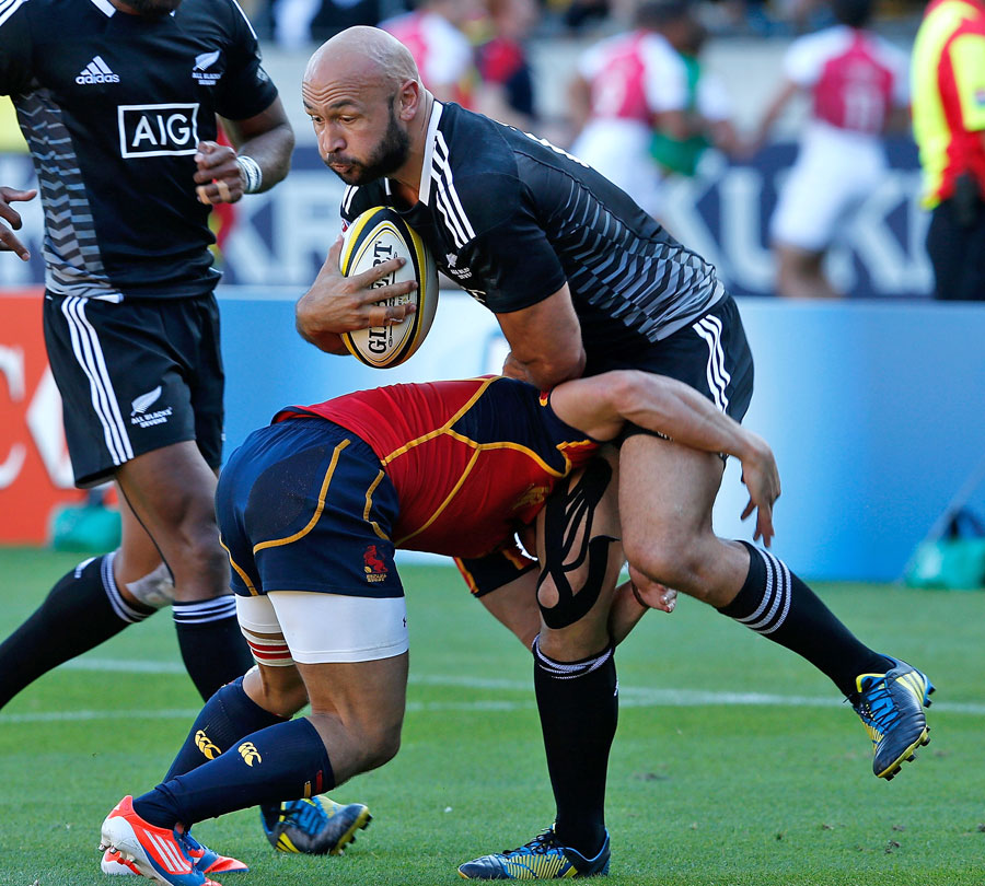 New Zealand's DJ Forbes rides a tackle