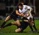 England Saxons' Elliot Daly goes into contact