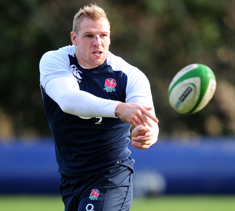 England's James Haskell passes the ball in training