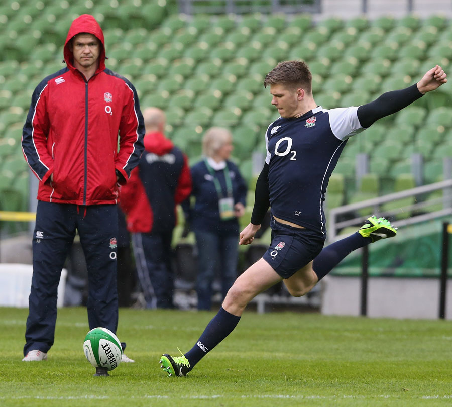 England's Owen Farrell warms up for his side's latest clash