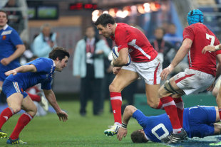 Wales' Mike Phillips charges over France's Federic Michalak, France v Wales, Six Nations, Stade de France, Paris, France, February 9, 2013
