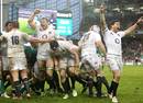 England's Chris Robshaw and Ben Youngs lead the celebrations in Dublin
