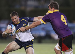 Clyde Rathbone of the Brumbies is tackled during the Super Rugby trial match, Brumbies v ACT XV, Viking Park, Canberra, February 8, 2013