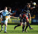 Worcester's Andy Goode charges down a kick by Northampton's Lee Dickson