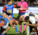 Grenoble's Valentin Courrent prepares to feed the scrum