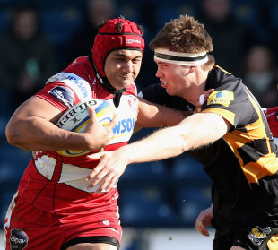 Gloucester's Sione Kalamafoni fends off Wasps' James Cannon, Wasps v Gloucester, Aviva Premiership, Adams Park, High Wycombe, England, February 17, 2013