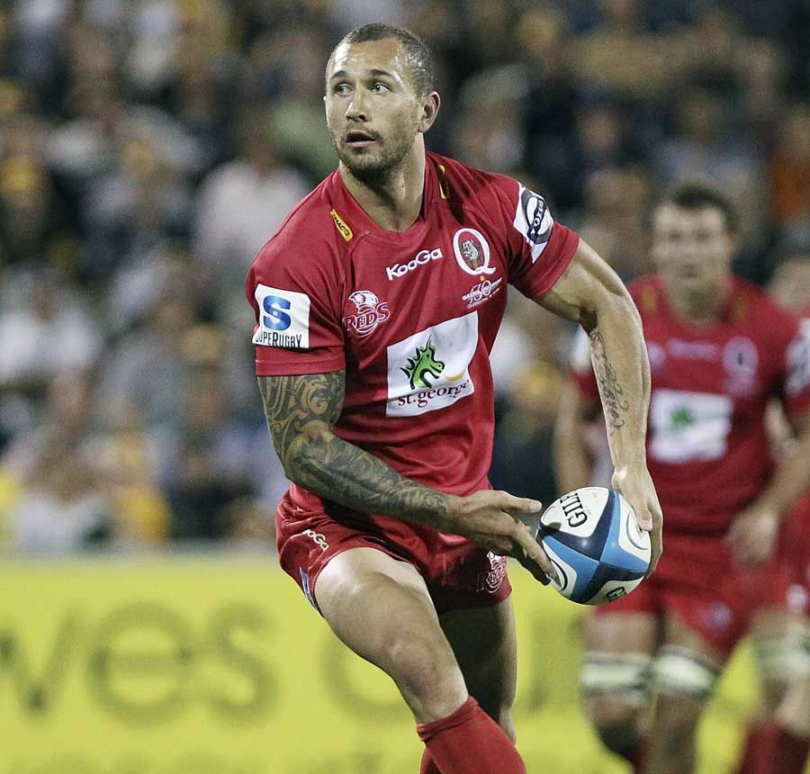 Quade Cooper runs the ball for the Reds against the Brumbies
