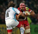 Gloucester's Sione Kalamafoni takes on Worcester's Andy Goode