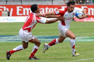 England's Ben Gollings is tackled by Tunisia's Mohamed Gara Ali during the IRB Sevens Series Day One match between England and Tunisia held at Outeniqua Park in George, South Africa on December 5, 2008. 