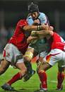 Bourgoin's Bogdan Leonte is shackled by the Worcester defence