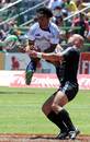 The United States' Tui Osborne and New Zealand's DJ Forbes compete for the ball 