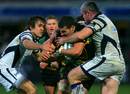 Northampton's Mark Easter is shackled by the Bristol defence