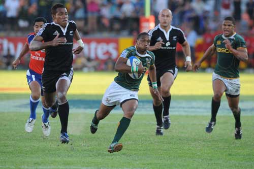 Renfred Dazel of South Africa on his way to score 