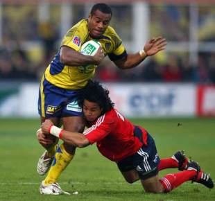 Clermont's Seremaia Bai is tackled by Munster's Lifeimi Mafi during their Heineken Cup Pool One match at the Stade Marcel Michelin in Clermont-Ferrand, France on December 7, 2008. 