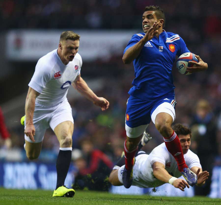 France's Wesley Fofana sprints away from the England defence