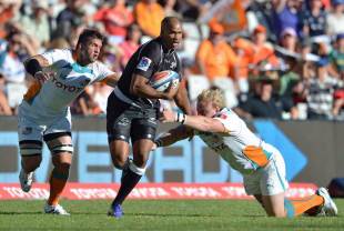 The Sharks' JP Pietersen runs through Cheetahs' tackles, Cheetahs v Sharks, Super Rugby, Free State Stadium, Bloemfontein, February 23, 2013