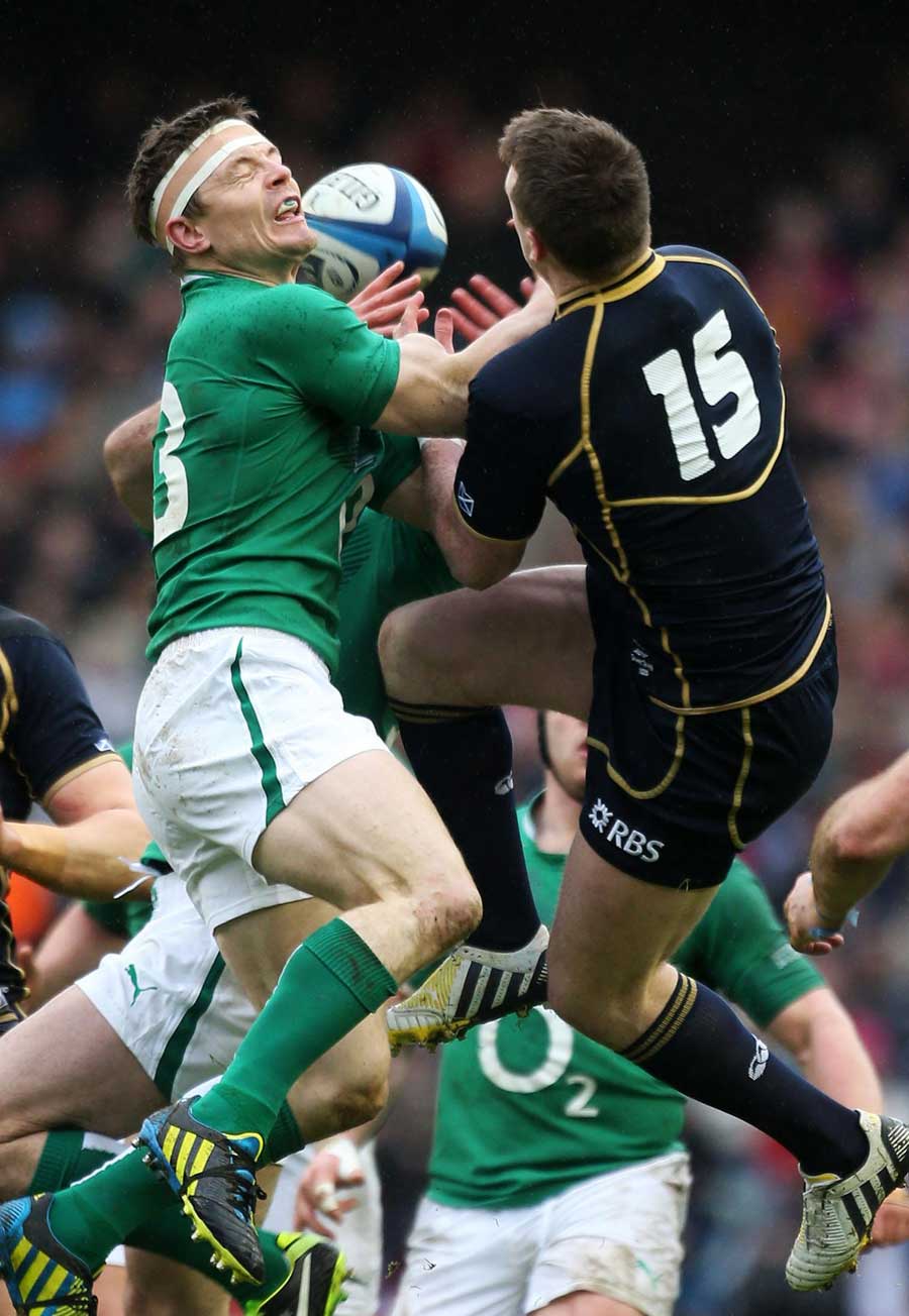 Ireland's Brian O'Driscoll vies with Stuart Hogg for the high ball