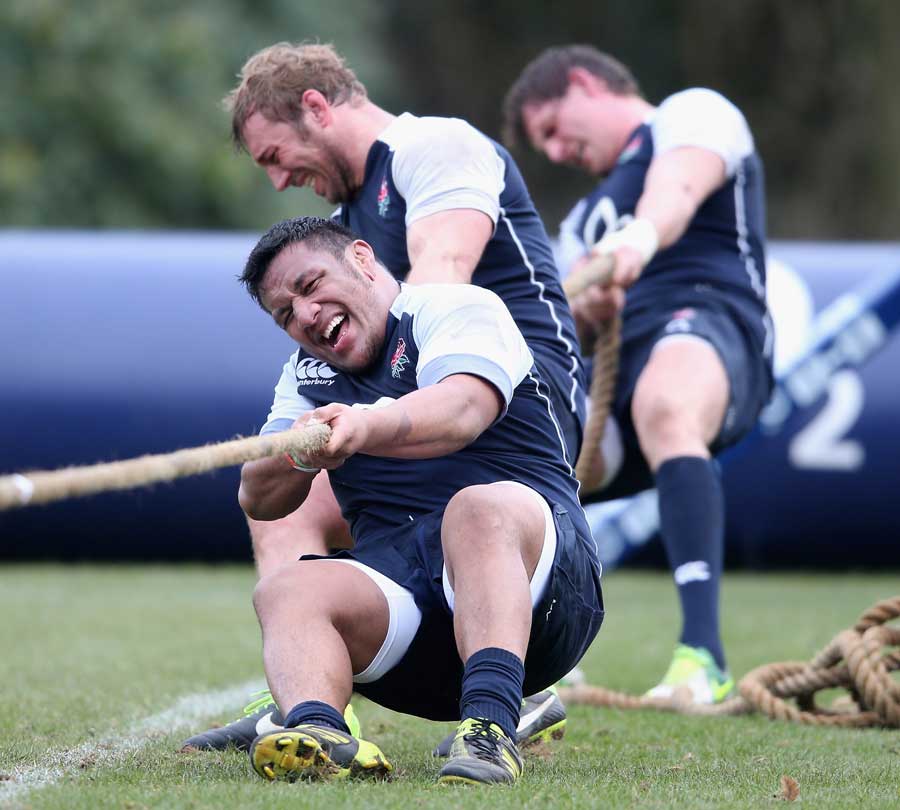 England's Mako Vunipola tries his hand at tug o' war