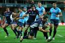 The Rebels' Ged Robinson scores a try against the Waratahs