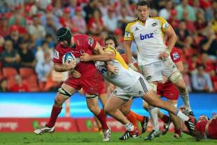 The Reds' Liam Gill carries the ball against the Hurricanes, Queensland reds v Hurricanes, Super Rugby, Suncorp Stadium, Brisbane, March 1, 2013