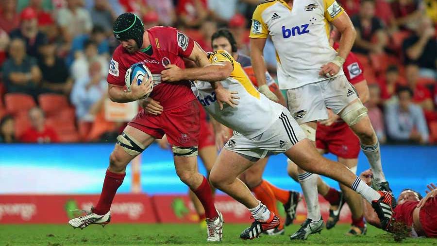 The Reds' Liam Gill carries the ball against the Hurricanes, Queensland reds v Hurricanes, Super Rugby, Suncorp Stadium, Brisbane, March 1, 2013