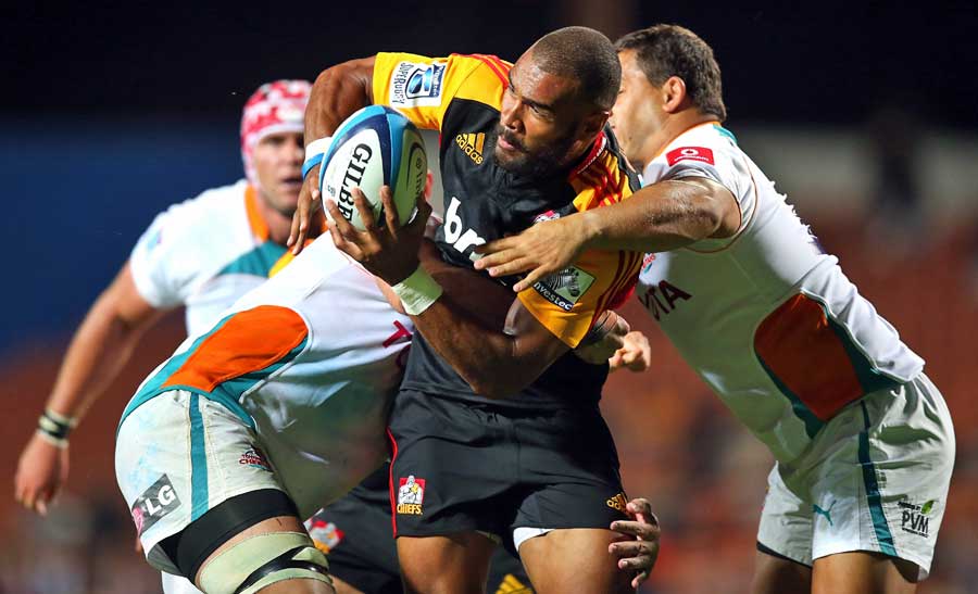The Chiefs' Patrick Osborne is tackled during the match against the Cheetahs