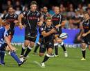 The Sharks' Patrick Lambie passes the ball against the Stormers