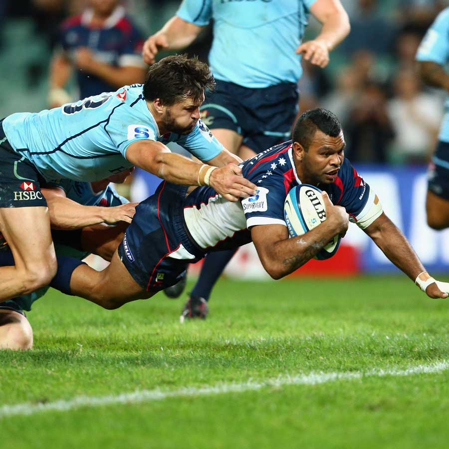 The Rebels' Kurtley Beale scores a try against the Waratahs