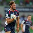 The Rebels' Scott Higginbotham scores a try against the Brumbies