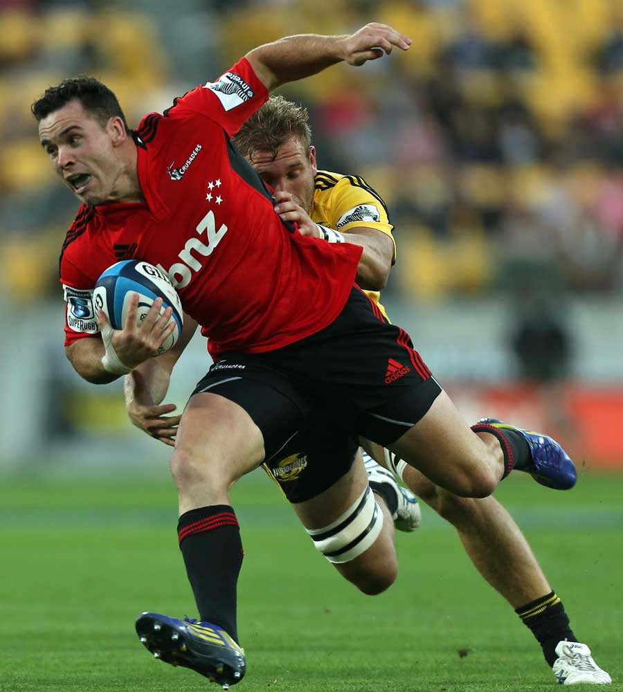 The Crusaders' Ryan Crotty scores a try against the Hurricanes