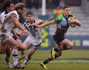 Harlequins' Tom Williams races clear of the Bath defence