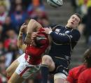 Wales' Leigh Halfpenny and Scotland's Stuart Hogg contest the high ball