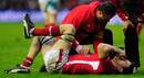 Wales' Ryan Jones lies stricken on the turf